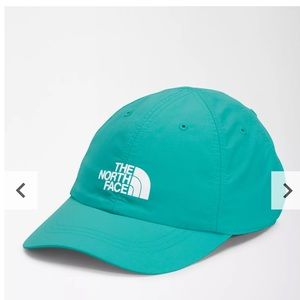 North Face teal/ green hat. Never worn, great condition!